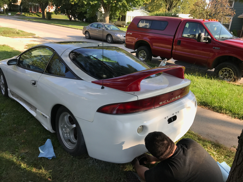 Bumper paint matched, GST wheels still on. Spoiler still red, we swapped the spoiler from the white car instead of painting it.